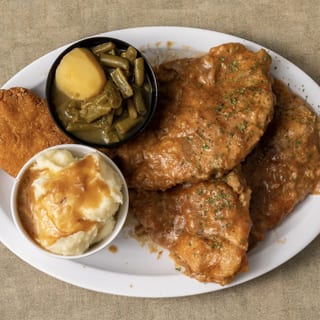 SM0THERED PORK CHOPS